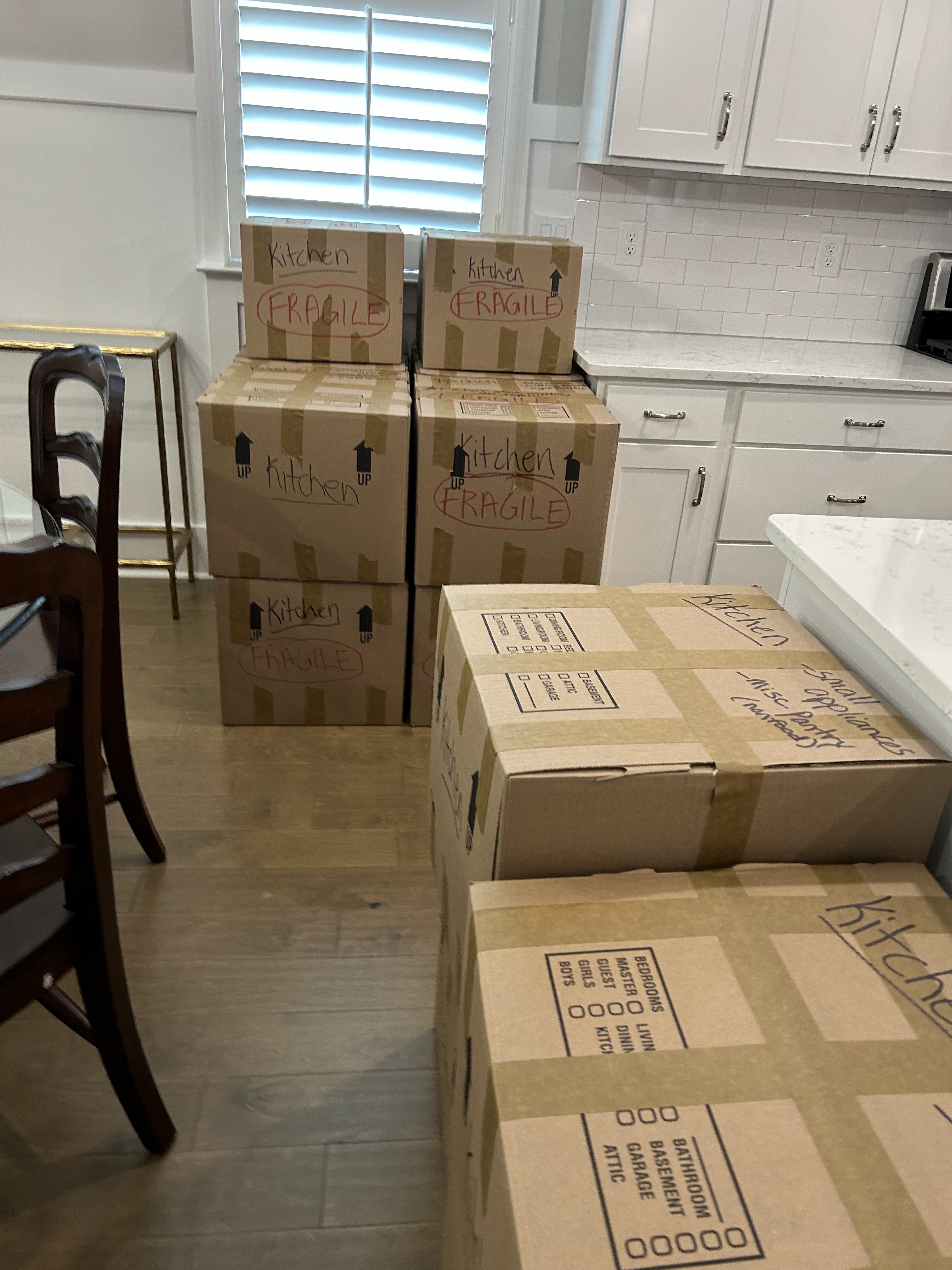 Packed and labeled moving boxes